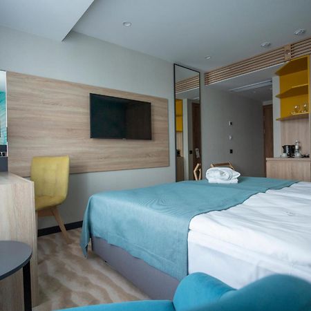 Premier Hotel Одесса Номер фото A room at the hotel